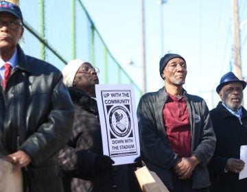 Residents protest against the planned Temple University stadium during a rally this week. (Angela Gervasi/for WHYY)