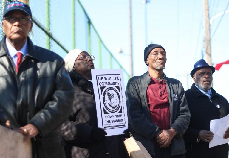 Residents protest against the planned Temple University stadium during a rally this week. (Angela Gervasi/for WHYY)