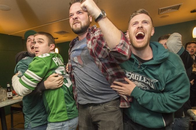 At Jon's Bar & Grille fans erupt as Eagles win the Super Bowl in the final seconds of the game.