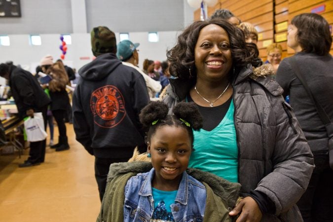 Merisha Sturgis and her daughter Alana, 8, started a book club for girls at Alana’s school. (Kimberly Paynter/WHYY)