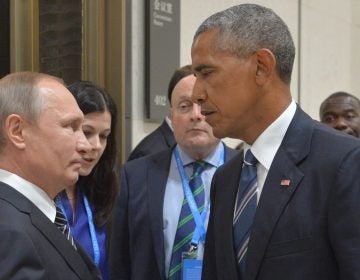 Russian President Vladimir Putin speaks with then-President Barack Obama in Hangzhou, China, on Sept. 5, 2016. Obama's warnings about active measures went unheeded.
(Alexei Druzhinin/AP)