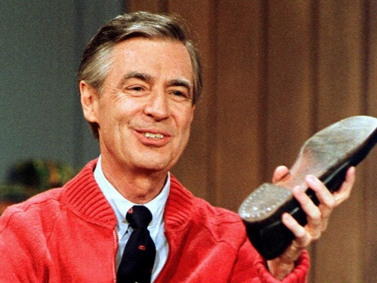 Fred Rogers rehearses the opening of his PBS show Mister Rogers' Neighborhood, which premiered Feb. 19, 1968. Gene J. Puskar/AP