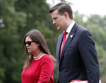 White House press secretary Sarah Sanders with former staff secretary Rob Porter in August. In the wake of Porter’s resignation, Sanders has reassured reporters that President Trump is sympathetic to victims of domestic abuse. White House press secretary Sarah Sanders with former staff secretary Rob Porter in August.