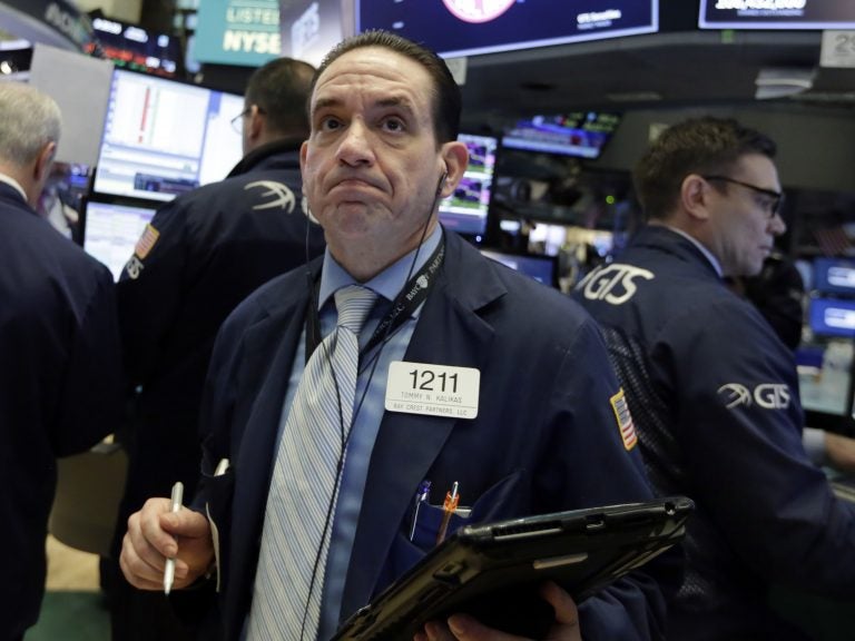On the floor of the New York Stock Exchange, trader Tommy Kalikas looks on as stock indexes continued to fall Monday. On the floor of the New York Stock Exchange, trader Tommy Kalikas looks on as stock indexes continued to fall Monday.