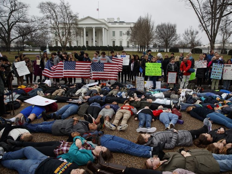 Demonstrators participate in a 