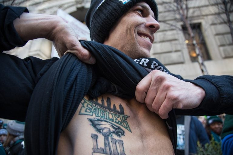 Jason Yurchak, 33, got the best present for his birthday, Eagles took home the Lombardi trophy. To mark the occassion, he went out on the day after the game and got a permanent reminder of the game. (Emily Cohen for WHYY)