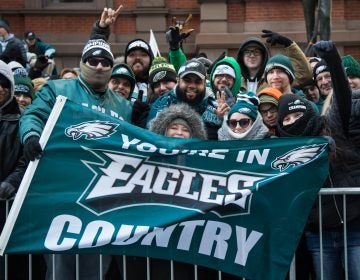 Friends from North Philadelphia faced the cold since 530am to get the best spot they could for the Eagles Super Bowl Champions parade in Philadelphia February 8th 2018. (Emily Cohen for WHYY)