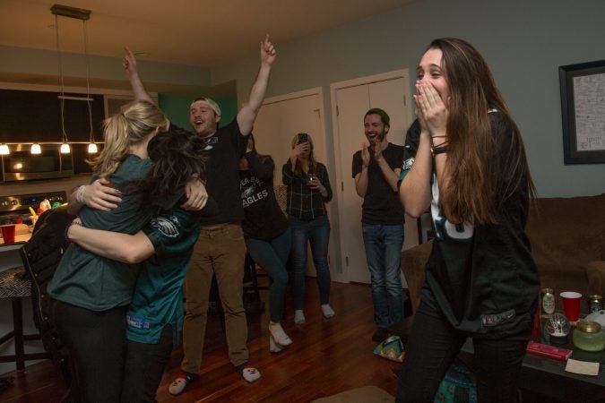 Rachel Miller (right) celebrates with friends after the Eagles score during the Super Bowl in Philadelphia February 4th 2018.