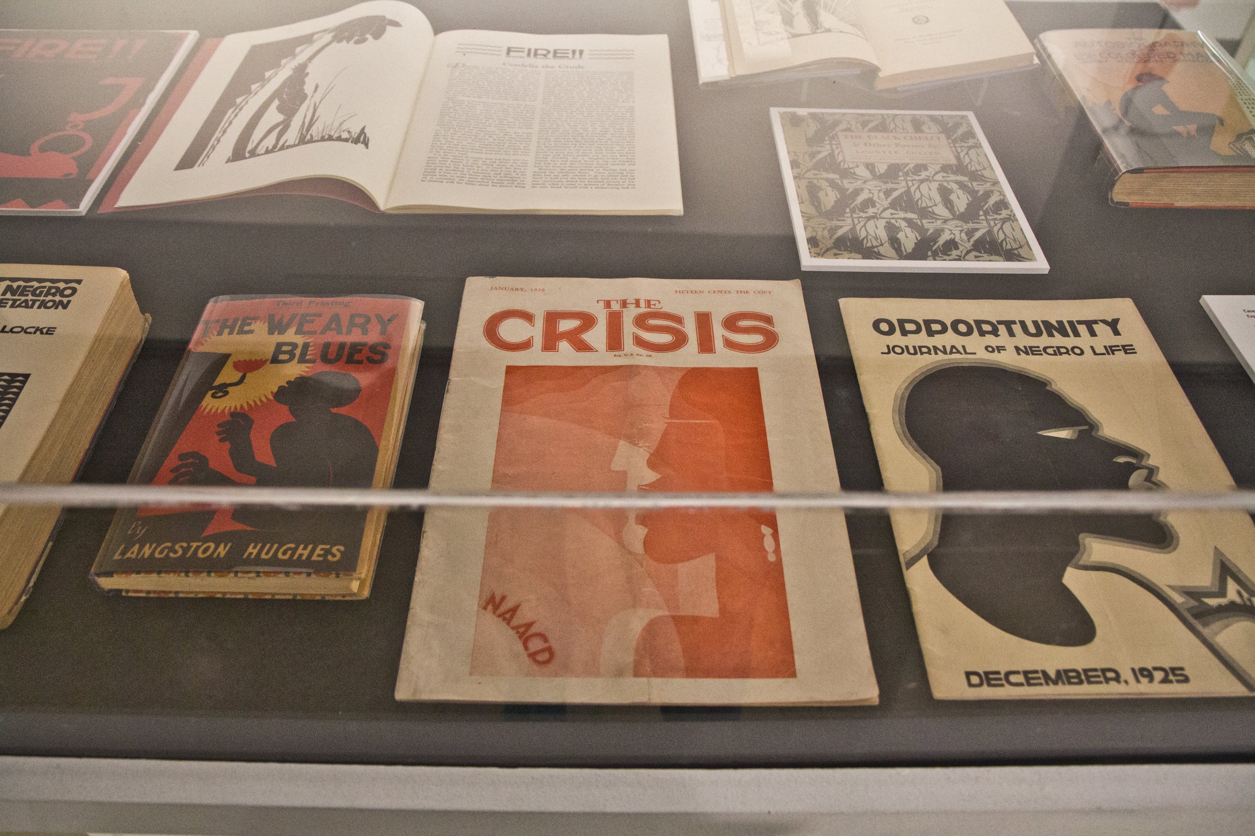 A display case at the African American Museum in Philadelphia shows various published items