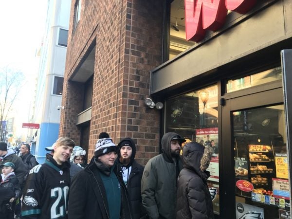 The line for the 10th and Locust PATCO station has spawned another, smaller line for the Wawa on Walnut near 10th