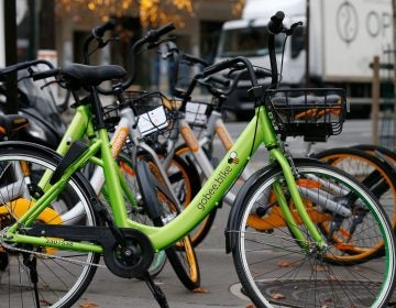 A Gobee bike sits near other bikeshare rental options in Paris on Nov. 18, 2017. (Geoffroy Van Der Hasselt/AFP/Getty Images)