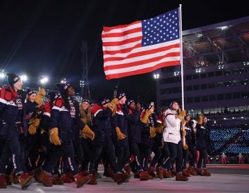 The United States team walks in the Parade of Athletes during the Winter Olympics opening ceremony on Friday. The team has more athletes than any nation at the Games and it's the most diverse of any U.S. winter squad, in terms of both race and gender. There are 108 women on the team, more than any other U.S. Winter Olympics team in the past.