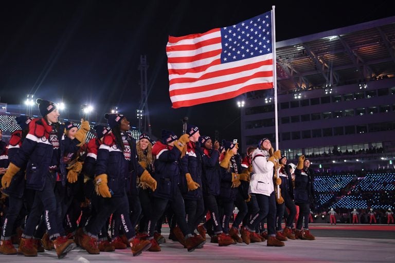 The United States team walks in the Parade of Athletes during the Winter Olympics opening ceremony on Friday. The team has more athletes than any nation at the Games and it's the most diverse of any U.S. winter squad, in terms of both race and gender. There are 108 women on the team, more than any other U.S. Winter Olympics team in the past.