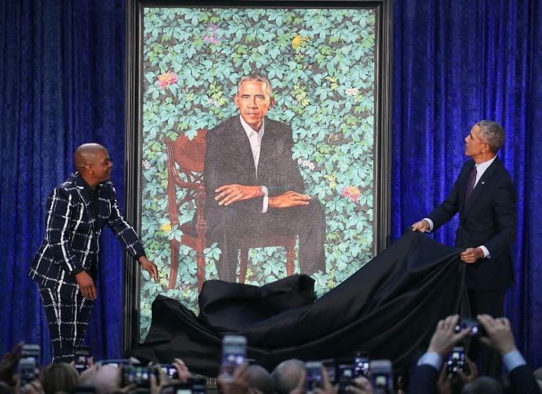 Former President Barack Obama (right) and artist Kehinde Wiley unveil his portrait during a ceremony at the Smithsonian's National Portrait Gallery. (Mark Wilson/Getty Images) 