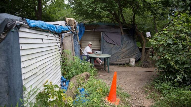 Dave Ritchie, a plumber by trade, lives in a self-made shack in the Pennsylvania woods. (Lindsay Lazarski/WHYY) 