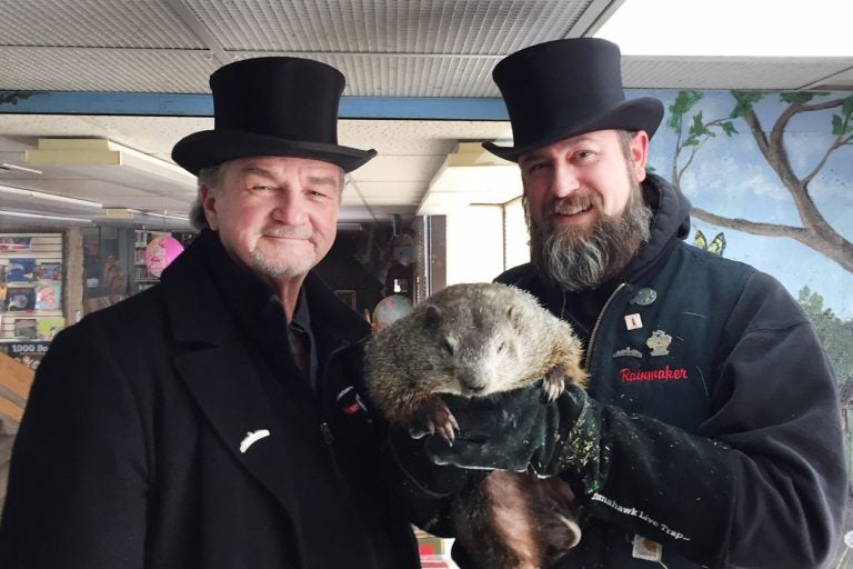 John Griffiths and A.J. Dereume, members of Punxsutawney Phil’s “Inner Circle,” hold the famous groundhog. John Griffiths and A.J. Dereume, members of Punxsutawney Phil's