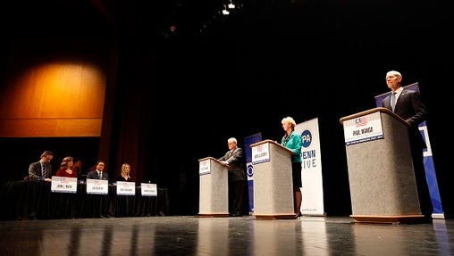 The three GOP gubernatorial hopefuls participated in a live, hourlong debate at Harrisburg Area Community College, moderated by Harrisburg journalists. (Chris Knight/AP Photo)