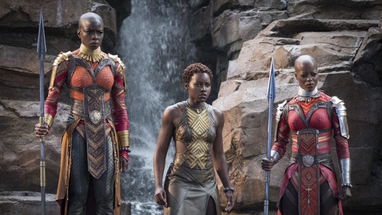 Danai Gurira, Lupita Nyong'o and Florence Kasumba are pictured in a scene from the film, Black Panther. Gurira says the representation of women in Black Panther is important for young girls to see. (Matt Kennedy/Disney/Marvel Studios via AP)