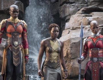 Danai Gurira, Lupita Nyong'o and Florence Kasumba are pictured in a scene from the film, Black Panther. Gurira says the representation of women in Black Panther is important for young girls to see. (Matt Kennedy/Disney/Marvel Studios via AP)