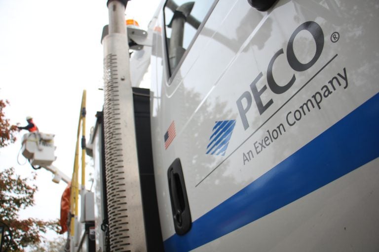 PECO truck in the foreground, PECO worker in the background