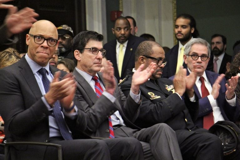 Top administrators (from left) schools Superintendent William Hite, Managing Director Michael DiBerardinis, Sheriff Jewel Williams, and District Attorney Larry Krasner, applaud during Mayor Jim Kenney's budget address. (Emma Lee/WHYY)