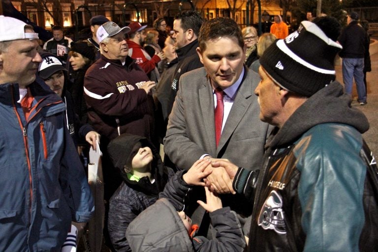 Former Deputy Mayor Rich Lazer (second from right) launches his congressional race at a South Philadelphia playground.