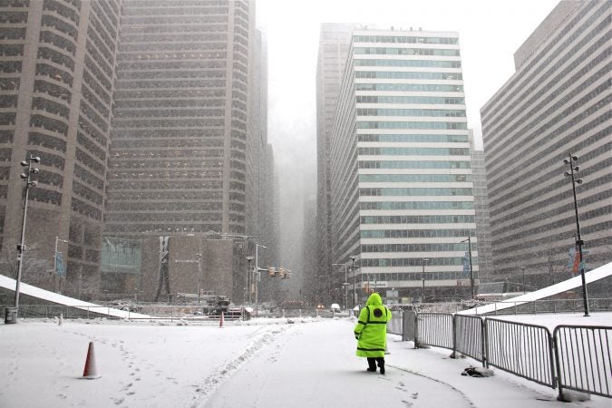 Snow fills the City Hall apron, looking North on Market Street. (Emma Lee/WHYY)