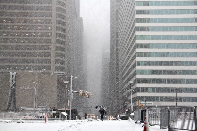 Snow fills the City Hall apron, looking North on Market Street. (Emma Lee/WHYY)