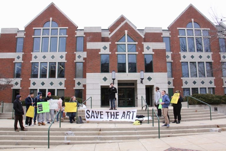 About 20 people turned out for a protest in front of La Salle University's Connelly Library. They object to the decision by the university's board of trustees to sell 46 works of art to pay for educational programs.