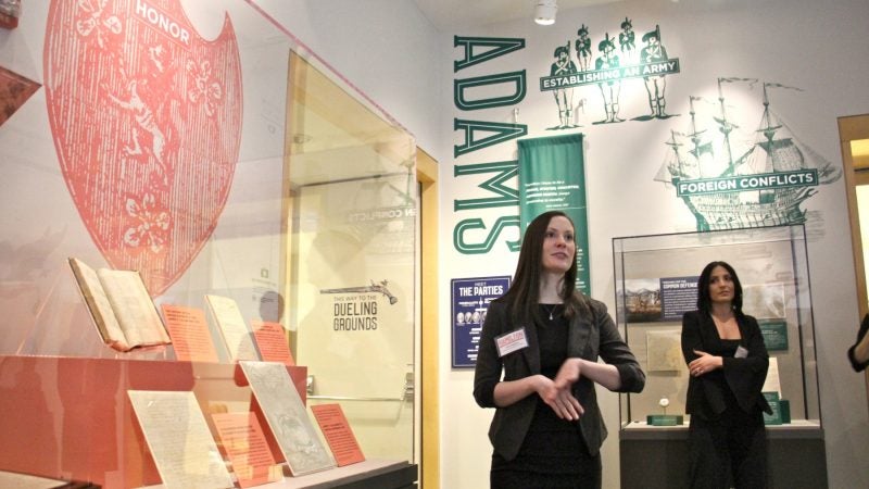 National Constitution Center curator Elena Popchock (center) built the exhibit around Hamilton's rivalries. (Emma Lee/WHYY)