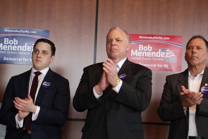 New Jersey Senate President Steve Sweeney applauds at a Bob Menendez re-election campaign event in Deptford Township. (Emma Lee/WHYY)