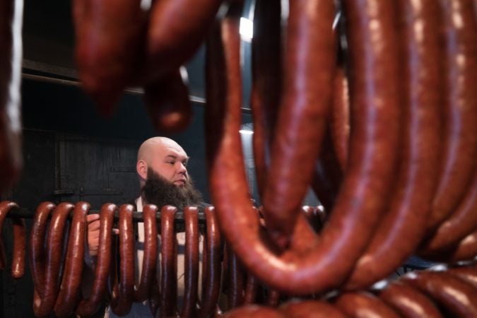 Frank Musser stands just outside the smokehouses at Czerw's Polish Kielbasa in Port Richmond.