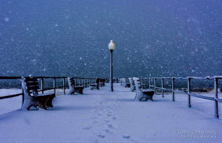 Snow falling early Tuesday morning at the Ocean Grove pier. (Image: John Entwistle Photography )