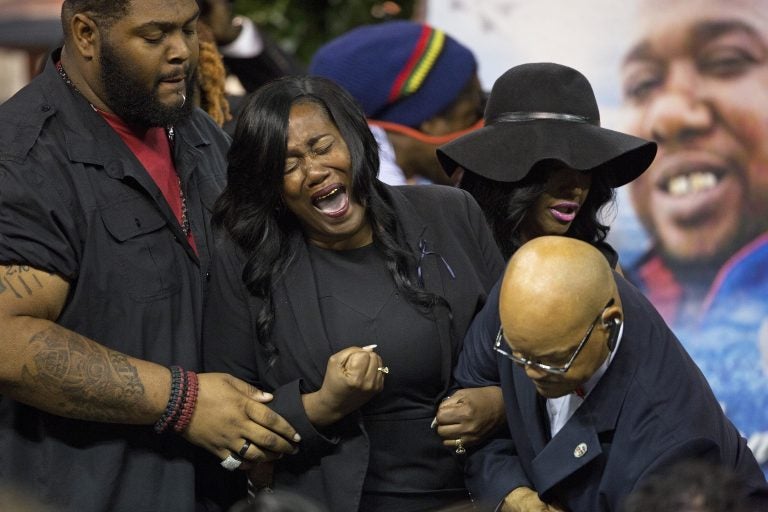 Sandra Sterling, the aunt of Alton Sterling cries out after viewing his body at the F.G. Clark Activity Center in Baton Rouge, La., Friday, July 15, 2016. Alton Sterling was shot July 5 outside a Baton Rouge convenience store in an encounter with police that was caught on video.