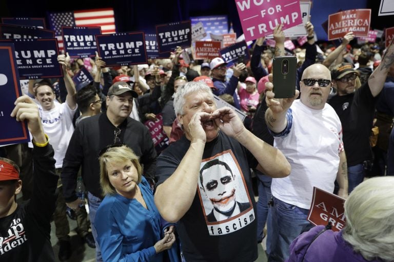 People chant toward the media area before a rally with Republican presidential candidate Donald Trump, Saturday, Nov. 5, 2016, in Reno, Nev. (AP Photo/John Locher)