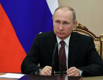 In this Jan. 26, 2018, photo, Russian President Vladimir Putin chairs a Security Council meeting in Moscow, Russia. The State Department has notified Congress that it will not impose new sanctions on Russia at this time. The State Department says it is confident that new legislation enacted last year is significantly deterring Russian defense sales. (Mikhail Klimentyev, Sputnik, Kremlin Pool Photo via AP)