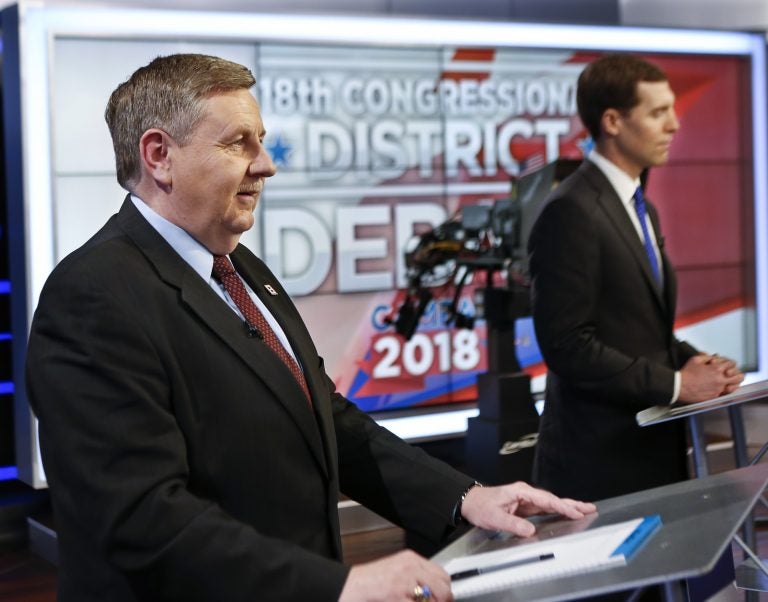 Republican Rick Saccone, left, and Democrat Connor Lamb before the taping of their first debate in the special election in the Pa., 18th Congressional District at the KDKA TV studios, Monday, Feb. 19, 2018, in Pittsburgh. The debate was recorded in the afternoon and scheduled to be broadcast at 7 PM Monday.