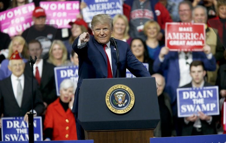 President Donald Trump reacts to the crowd while speaking at a campaign rally for Republican Rick Saccone in a hangar, Saturday, March 10, 2018, in Moon Township, Pa. Saccone is running against Democrat Conor Lamb in a special election being held on March 13 for the Pennsylvania 18th Congressional District vacated by Republican Tim Murphy.