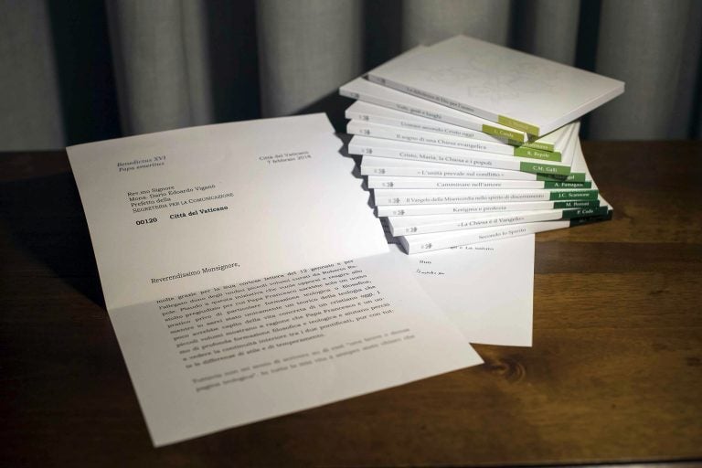 In this photo of a letter released by Vatican Media, retired Pope Benedict XVI praises a volume of books about the theological training of Pope Francis. The Vatican admitted Thursday, March 14, 2018 that it blurred the final two lines of the letter's first page, where Benedict begins to acknowledge that he didn't read the books and doesn't have time to write a theological assessment of Francis as requested. (Vatican Media photo via AP)