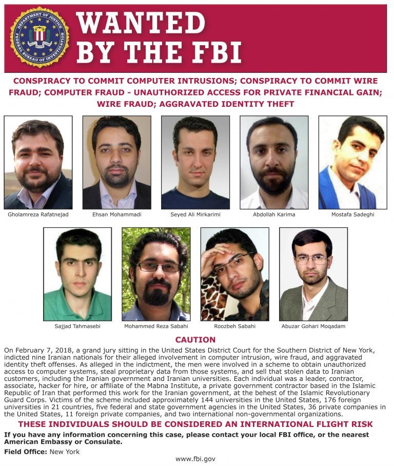 This image released by the FBI is the wanted posted for 9 Iranians that took part in a government-sponsored hacking scheme that pilfered sensitive information from hundreds of universities, private companies and government agencies. (FBI via AP)