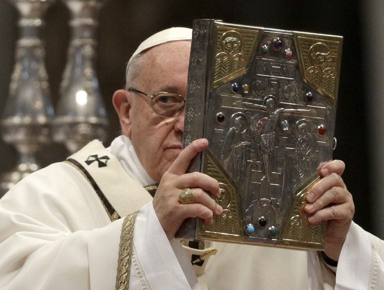 Pope Francis celebrates a Chrism Mass inside St. Peter's Basilica, at the Vatican, Thursday, March 29, 2018. During the Mass the pontiff blesses a token amount of oil that will be used to administer the sacraments for the year. (Gregorio Borgia/AP Photo)