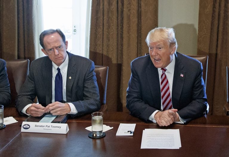 In this file photo, Sen. Pat Toomey, R-Pa. listens as President Donald Trump speaks during a meeting with lawmakers about trade policy in the Cabinet Room of the White House, Tuesday, Feb. 13, 2018, in Washington. (Evan Vucci/AP Photo, file)