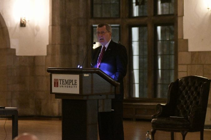 Temple University's President Richard M. Englert attempts to present plans for the proposed $130 million, 35,000 seat stadium on Temple's campus, on Tuesday. (Bastiaan Slabbers/for WHYY)