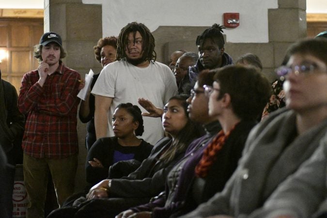 Community members, activist and students shut down a town hall meeting about the proposed $130 million, 35,000 seat stadium on Temple's campus, on Tuesday. (Bastiaan Slabbers/for WHYY)