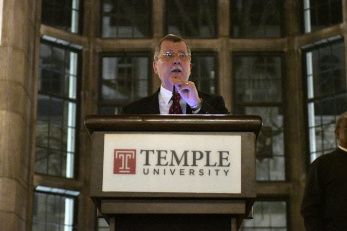 Temple University's President Richard M. Englert attempts to present plans for the proposed $130 million, 35,000 seat stadium on Temple's campus, on Tuesday. (Bastiaan Slabbers/for WHYY)