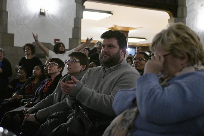 Community members, activist and students shut down a town hall meeting about the proposed $130 million, 35,000 seat stadium on Temple's campus, on Tuesday. (Bastiaan Slabbers/for WHYY)