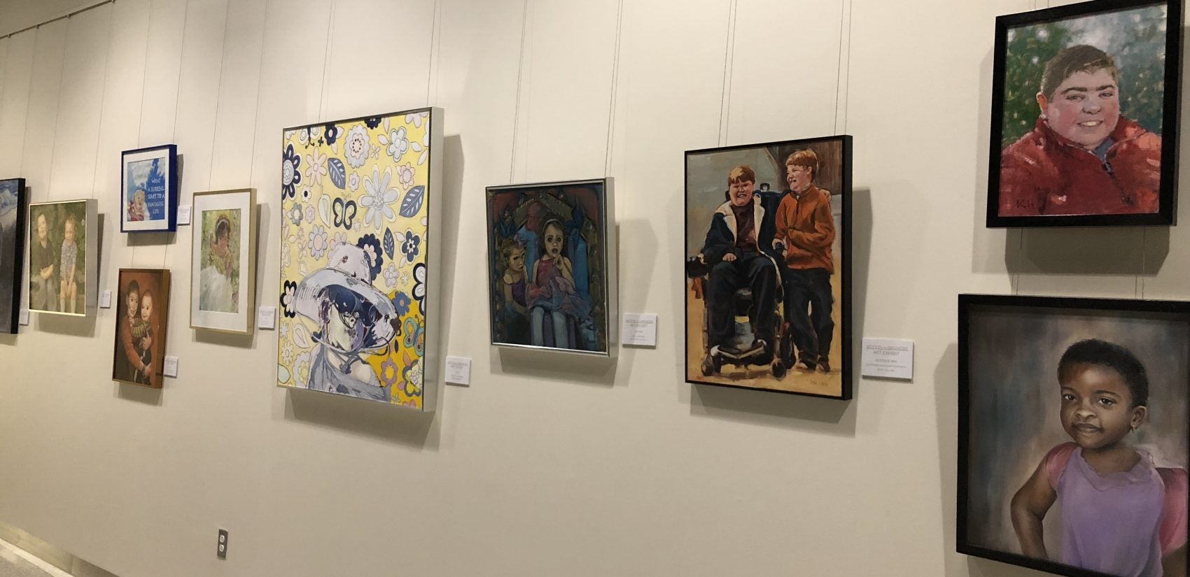 A unique art exhibit that focuses on children living with a rare disease is now on display at Nemours/Alfred I. duPont Hospital for Children in Wilmington. (Shirley Min/WHYY)