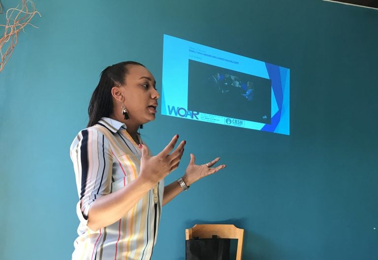 Juliana Sarita from Women Organized Against Rape leads a training on workplace sexual harassment at a taqueria in South Philadelphia. (Laura Benshoff/WHYY)