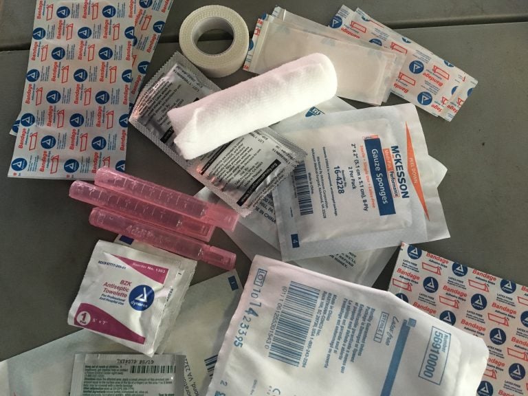 A spread of ointments, gauze, sterile water and other items stocked inside Prevention Point Philadelphia’s mobile wound care unit.  (Elana Gordon / WHYY)