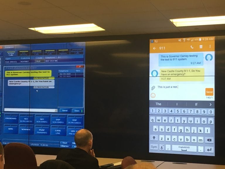 Delaware leaders unveil the state's new text-to-911 system at the New Castle County 911 center. (Mark Eichmann/WHYY)